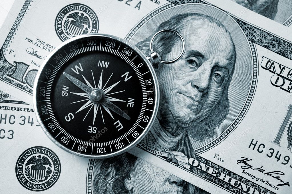 Compass and money — Stock Photo © provasilich 5262869