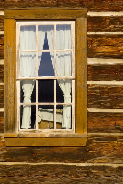 Old log cabin window — Stock Photo, Image