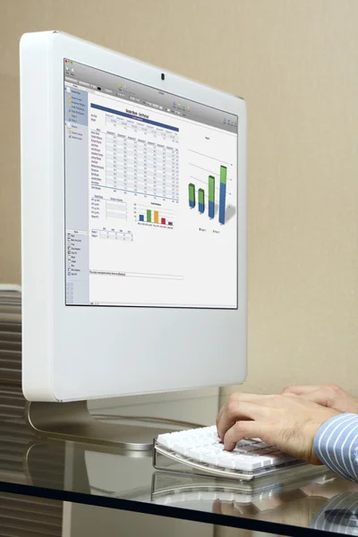 stock image Men at work on a modern white computer. Glass desk. Diagram on a screen.