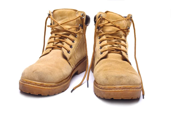 Pair of old yellow boots — Stock Photo, Image