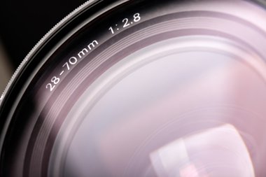 Close-up camera lens. Backdrop for your design. clipart