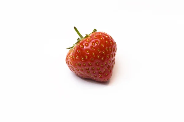 stock image A strawberry isolated over a white background