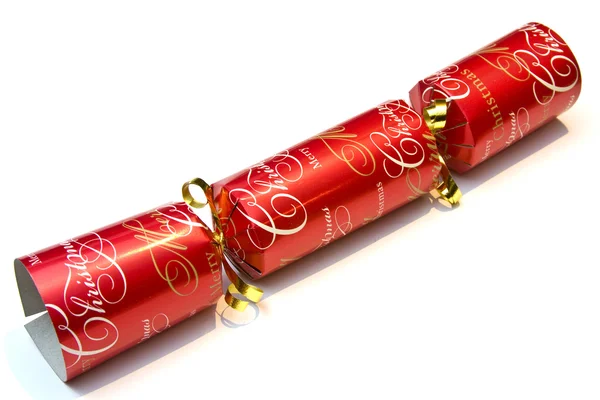 stock image Festive christmas cracker over a white background