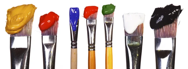 Brushes with paint — Stock Photo, Image