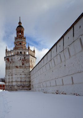 The tower and the wall of the Holy Trinity St. Sergius Lavra clipart