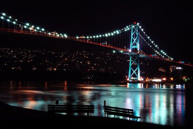 Night scene of Lions Gate Suspension Bridge Gateway clipart