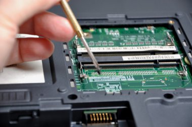 Repairing a laptop clipart