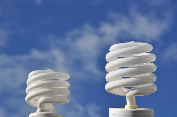 Save energy bulb against sky — Stock Photo, Image