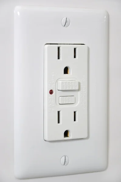 Outlet with secured button — Stock Photo, Image