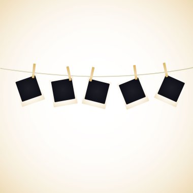 Set of 5 blank photos hanging on a line. Available in jpeg and eps8 formats. clipart