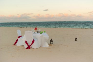 Romantic dinner on the beach clipart