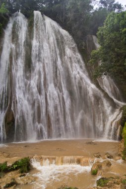 Waterfall after tropical rain clipart