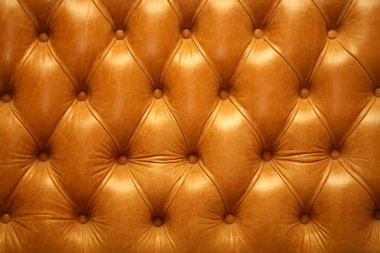 Sepia picture of genuine leather upholstery clipart