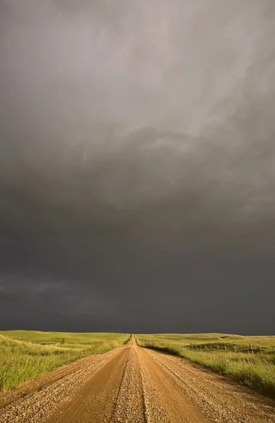 Storm clouds over Saskatchewan country road — Stock Photo, Image