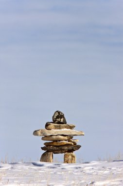 Inukshuk in Winter Canada clipart