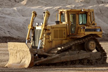 Idle bulldozer in Saskatchewan clipart