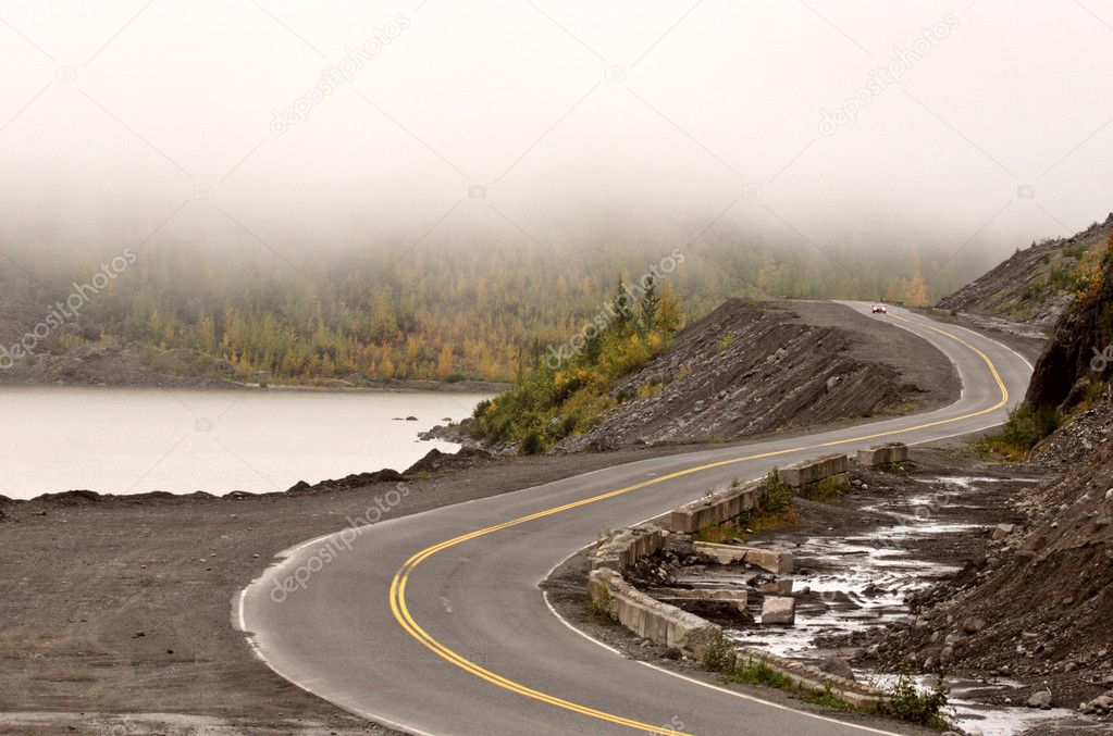 Curving road and low clouds in British Columbia