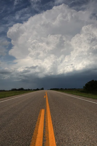 stock image Storm clouds down a Saskatchewan highway