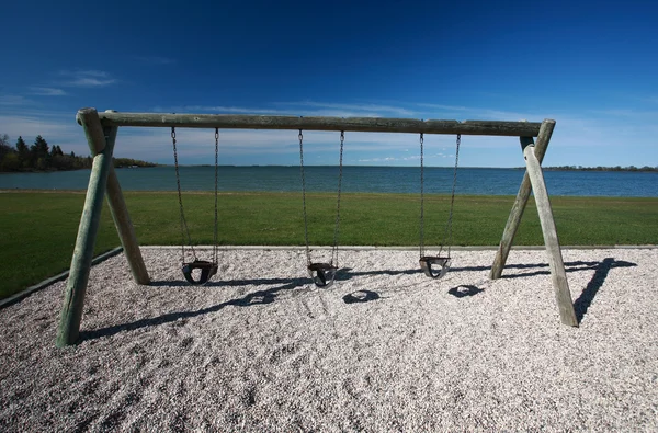 Parque infantil a lo largo de la orilla del lago Winnipeg —  Fotos de Stock