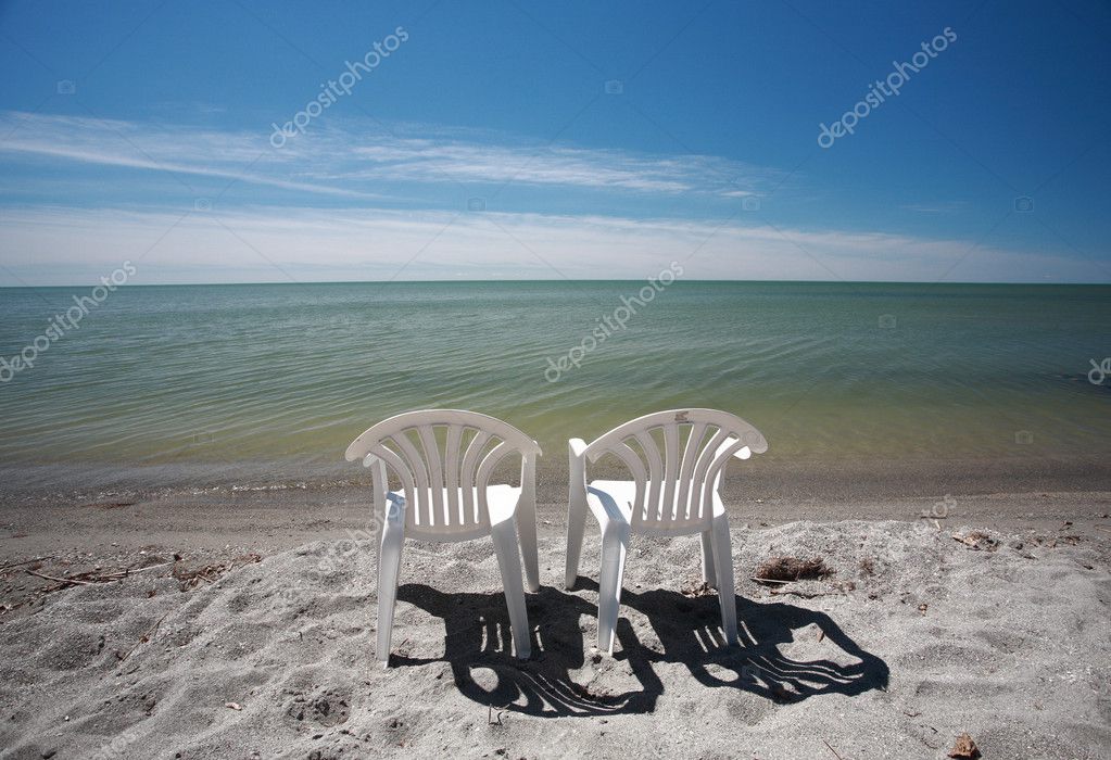 Lawn Chairs Along Beach Of Lake Winnipeg Stock Photo Pictureguy Lawn Chairs Along Beach Of Lake Winnipeg Stock Photo