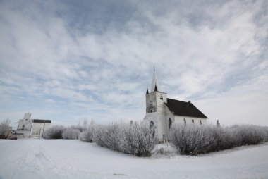 Old country church and elevator in Aylesbury clipart