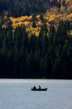 Two fishermen boating on Reesor Lake clipart