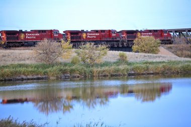 Diesel engines reflected on water clipart