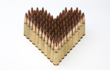 Heart made of rifle ammunitions clipart