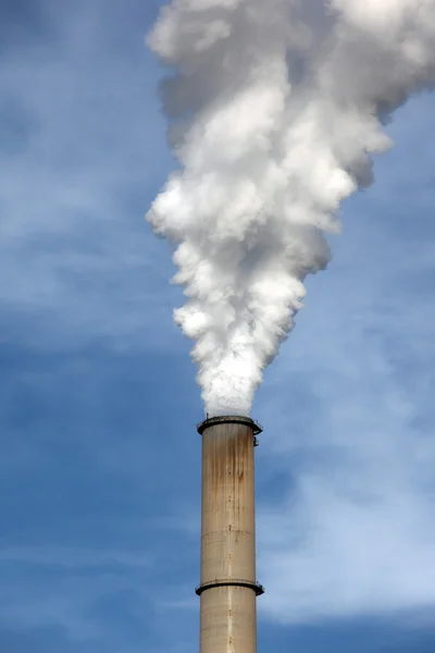 Smoke coming out a chimney — Stock Photo, Image