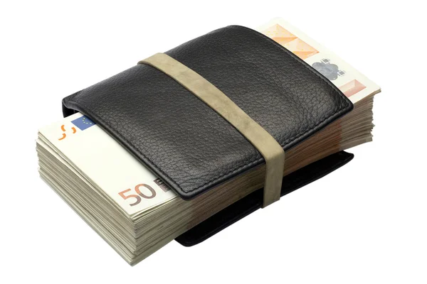 Montones de euros en una cartera — Foto de Stock