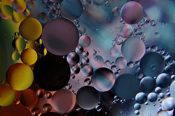 Colored oil droplets, large and small