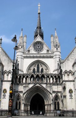 The entrance to the Royal Courts of Justice in London, England clipart