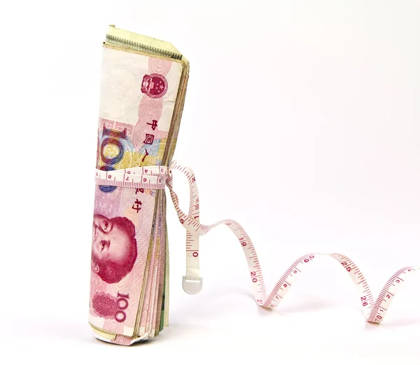 Paper money and tape measure — Stock Photo, Image