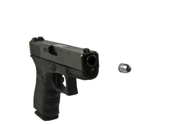 Pistola negra con bala — Foto de Stock
