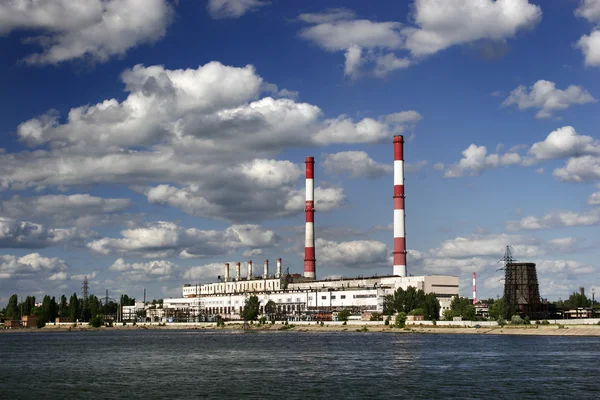 Stock image Power plant over river