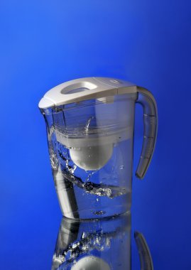 Water filter on blue background clipart