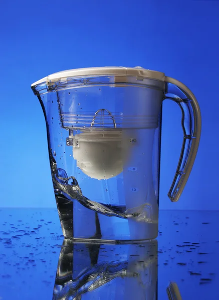 Water filter on blue background