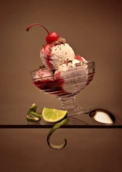 stock image Ice-cream with a cherry on top