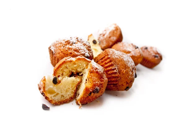Söta muffins på vit — Stockfoto