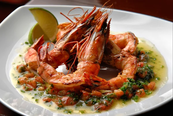 Shrimps on white plate — Stock Photo, Image