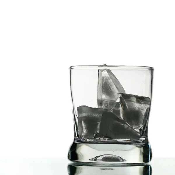 stock image Whisky splash alcohol drops isolated on white