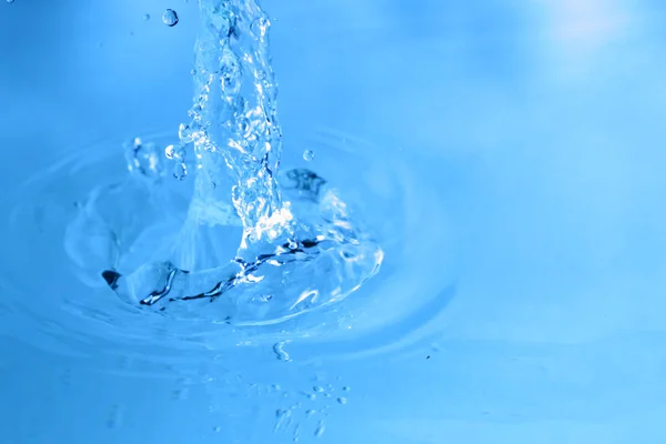 Blue water splash — Stock Photo, Image