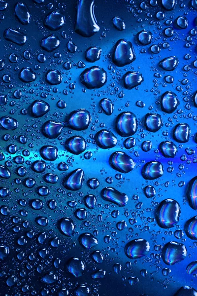 きれいなブルーの水滴のマクロの背景 — ストック写真