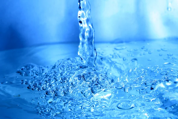 Salpicadura de agua azul —  Fotos de Stock
