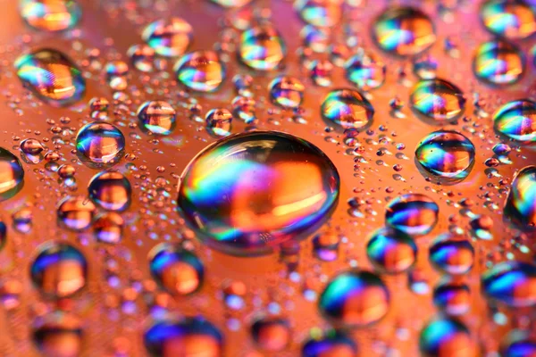 Veelkleurige waterdrops — Stockfoto