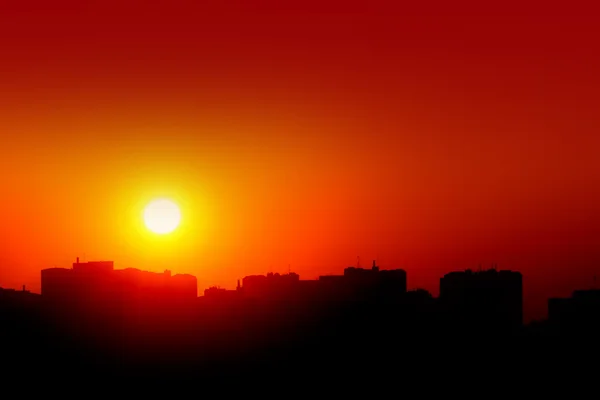 Під час заходу сонця міста — стокове фото