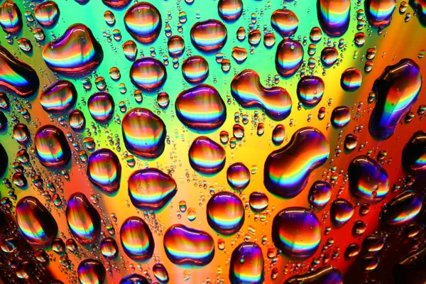 Gekleurde waterdruppels — Stockfoto