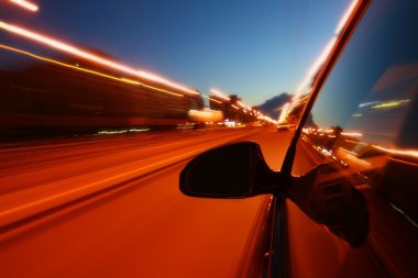 Speed drive on car at night motion blurred clipart