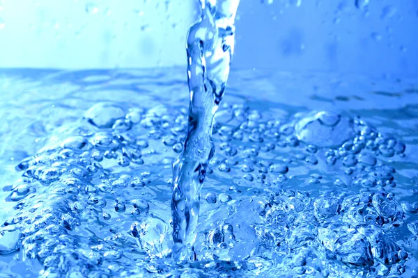 青い水スプラッシュ マクロをクローズ アップ — ストック写真