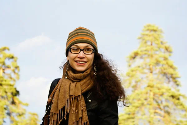The girl in a cap and a scarf — Stock Photo, Image